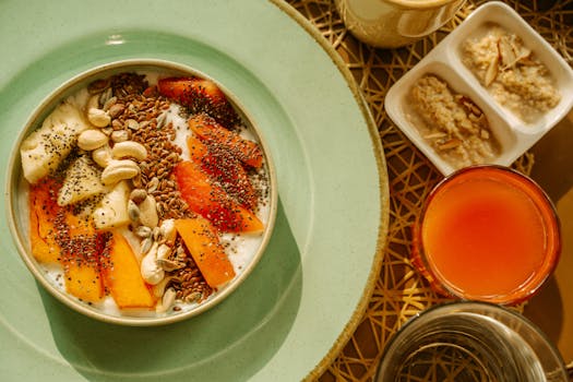 A delicious smoothie bowl topped with fresh fruit and nuts
