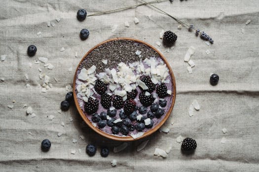 colorful smoothie bowl topped with fruits